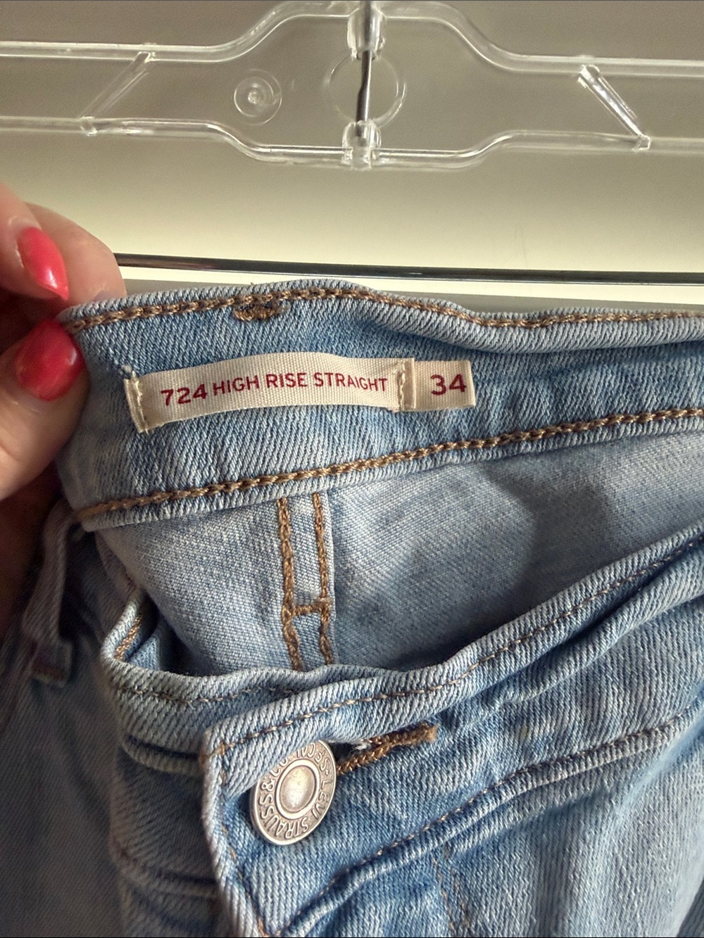 Levi's 724 high rise straight light blue jeans. Size 34! Good used condition.